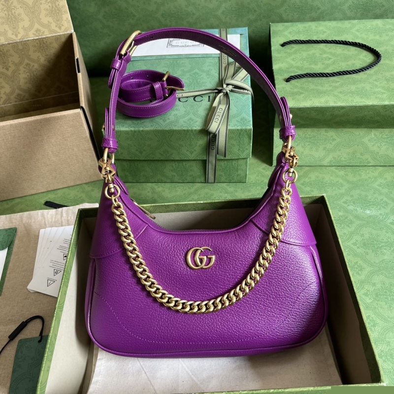 G*u*i top handle bags
